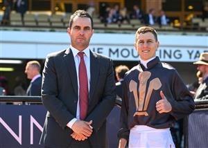 MELBOURNE, AUSTRALIA - OCTOBER 01: Damian Lane poses with trainer Andrew Forsman after riding She's Licketysplit to win race 3, the TAB Edward Manifold Stakes, during Turnbull Stakes Day at Flemington Racecourse on October 01, 2022 in Melbourne, Australia. (Getty)