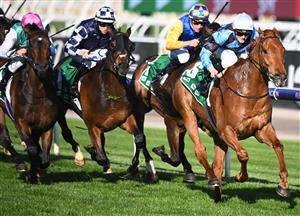 MELBOURNE, AUSTRALIA - OCTOBER 01: Ethan Brown riding Smokin' Romans after winning race 7, the TAB Turnbull Stakes, during Turnbull Stakes Day at Flemington Racecourse on October 01, 2022 in Melbourne, Australia. (Getty)