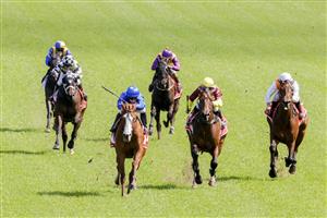 SYDNEY, AUSTRALIA - OCTOBER 01: James McDonald (all blue) on Cascadian wins race 4 the Fujitsu General Hill Stakes during Sydney Racing at Royal Randwick Racecourse on October 01, 2022 in Sydney, Australia. (Photo by Jenny Evans/Getty Images)
