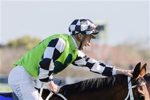 SYDNEY, AUSTRALIA - OCTOBER 01: James McDonald on Zougotcha returns to scale after winning race 6 the Darley Flight Stakes during Sydney Racing at Royal Randwick Racecourse on October 01, 2022 in Sydney, Australia. (Photo by Jenny Evans/Getty Images)