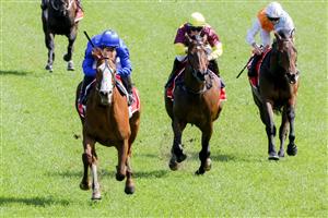 SYDNEY, AUSTRALIA - OCTOBER 01: James McDonald (all blue) on Cascadian wins race 4 the Fujitsu General Hill Stakes during Sydney Racing at Royal Randwick Racecourse on October 01, 2022 in Sydney, Australia. (Photo by Jenny Evans/Getty Images)
