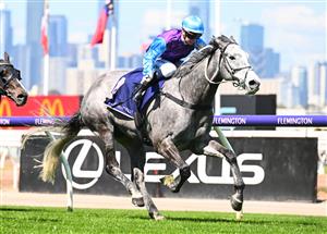 MELBOURNE, AUSTRALIA - OCTOBER 01: Jamie Kah riding Visinari winning Race 2, the Katherine Bourke Paris Lane Stakes, during Turnbull Stakes Day at Flemington Racecourse on October 01, 2022 in Melbourne, Australia. (Photo by Vince Caligiuri/Getty Images)
