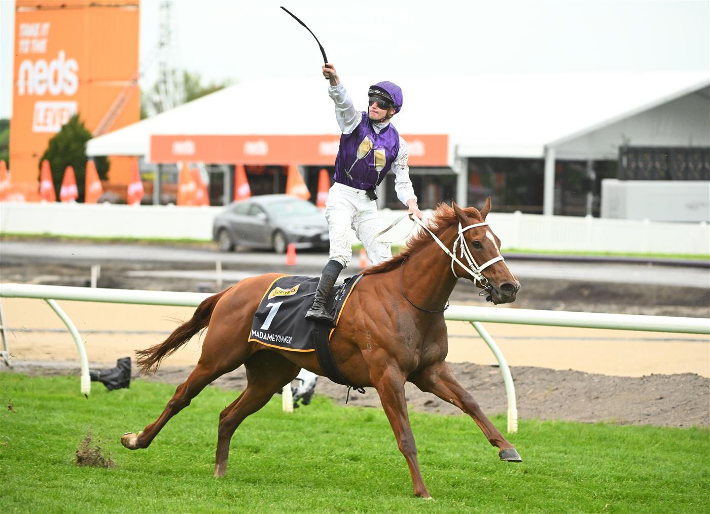 MELBOURNE, AUSTRALIA - OCTOBER 12: James McDonald riding Madame Pommery winning Race 8, the Schweppes Thousand Guineas, during Caulfield Thousand Guineas Day at Caulfield Racecourse on October 12, 2022 in Melbourne, Australia. (Photo by Vince Caligiuri/Getty Images)