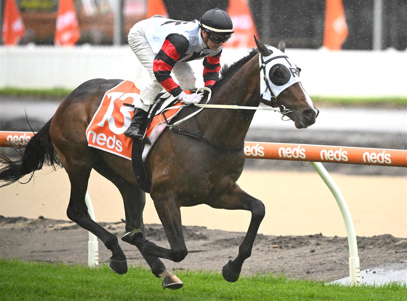 MELBOURNE, AUSTRALIA - OCTOBER 12: Jamie Kah riding Gunstock winning Race 3, the Neds Coongy Cup, during Caulfield Thousand Guineas Day at Caulfield Racecourse on October 12, 2022 in Melbourne, Australia. (Photo by Vince Caligiuri/Getty Images)