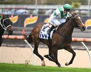 MELBOURNE, AUSTRALIA - OCTOBER 12: Alana Kelly riding Zoe's Promise to win Race 1, the IVE > Handicap during Caulfield Thousand Guineas Day at Caulfield Racecourse on October 12, 2022 in Melbourne, Australia. (Getty)