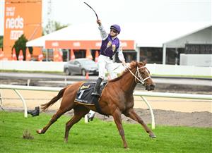MELBOURNE, AUSTRALIA - OCTOBER 12: James McDonald riding Madame Pommery winning Race 8, the Schweppes Thousand Guineas, during Caulfield Thousand Guineas Day at Caulfield Racecourse on October 12, 2022 in Melbourne, Australia. (Photo by Vince Caligiuri/Getty Images)