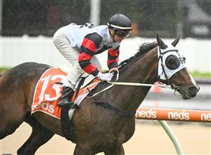 MELBOURNE, AUSTRALIA - OCTOBER 12: Jamie Kah riding Gunstock winning Race 3, the Neds Coongy Cup, during Caulfield Thousand Guineas Day at Caulfield Racecourse on October 12, 2022 in Melbourne, Australia. (Photo by Vince Caligiuri/Getty Images)