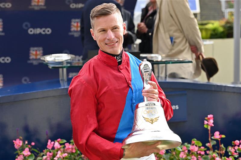 British jockey Richard Kingscote poses at the presentation for the Champion Stakes on Qipco British Champions Day at Ascot Racecourse, west of London on October 15, 2022. - Champions day is the finale of the British flat racing season and the UK's richest raceday. (Photo by Glyn KIRK / AFP) (Photo by GLYN KIRK/AFP via Getty Images)
