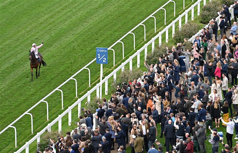 Italian jockey Frankie Dettori on Emily Upjohn react in front of the grandstand after victory in the British Champions Fillies and Mares Stakes on Qipco British Champions Day at Ascot Racecourse, west of London on October 15, 2022. - Champions day is the finale of the British flat racing season and the UK's richest raceday. (Photo by Glyn KIRK / AFP) (Photo by GLYN KIRK/AFP via Getty Images)