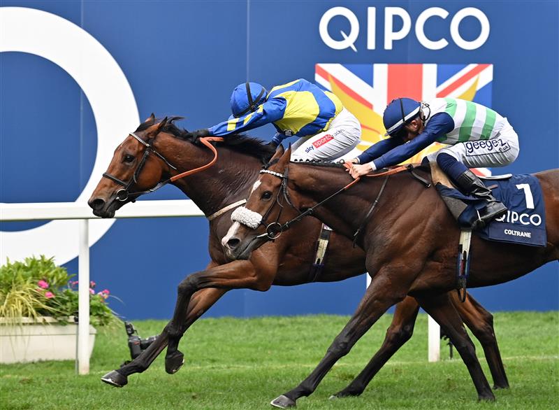 Jockey Hollie Doyle rides Trueshan (L) to victory over jockey David Probert on Coltrane in the Long Distance Cup on Qipco British Champions Day at Ascot Racecourse, west of London on October 15, 2022. - Champions day is the finale of the British flat racing season and the UK's richest raceday. (Photo by Glyn KIRK / AFP) (Photo by GLYN KIRK/AFP via Getty Images)