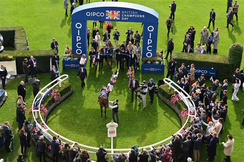 Italian jockey Frankie Dettori executes a flying dismount from Kinross after victory in the British Champions Sprint Stakes on Qipco British Champions Day at Ascot Racecourse, west of London on October 15, 2022. - Champions day is the finale of the British flat racing season and the UK's richest raceday. (Photo by Glyn KIRK / AFP) (Photo by GLYN KIRK/AFP via Getty Images)