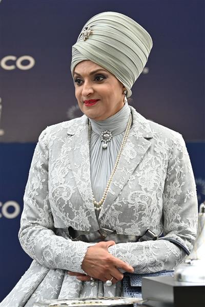Sheikha Amna bint Abdulaziz Al Thani waits at the presentation for the Champion Stakes on Qipco British Champions Day at Ascot Racecourse, west of London on October 15, 2022. - Champions day is the finale of the British flat racing season and the UK's richest raceday. (Photo by Glyn KIRK / AFP) (Photo by GLYN KIRK/AFP via Getty Images)