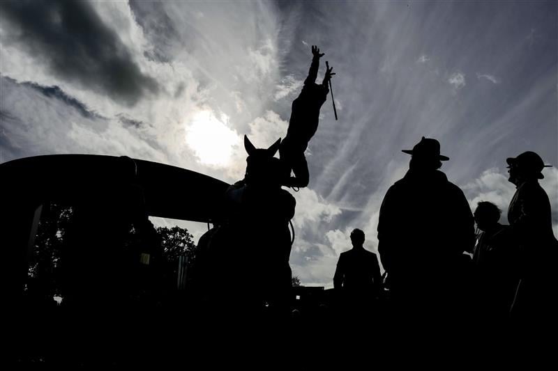 ASCOT, ENGLAND - OCTOBER 15: Frankie Dettori leaps from his mount after riding Emily Upjohn to win The Qipco British Champions Fillies & Mares Stakes at Ascot Racecourse on October 15, 2022 in Ascot, England. (Photo by Alan Crowhurst/Getty Images)