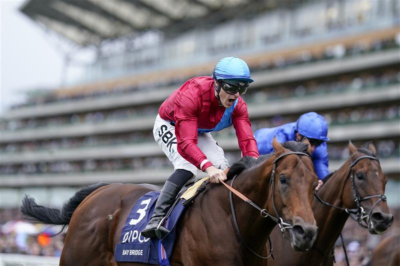 ASCOT, ENGLAND - OCTOBER 15: Richard Kingscote shouts as he rides Bay Bridge to win The Qipco Champion Stakes at Ascot Racecourse on October 15, 2022 in Ascot, England. (Photo by Alan Crowhurst/Getty Images)