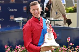 British jockey Richard Kingscote poses at the presentation for the Champion Stakes on Qipco British Champions Day at Ascot Racecourse, west of London on October 15, 2022. - Champions day is the finale of the British flat racing season and the UK's richest raceday. (Photo by Glyn KIRK / AFP) (Photo by GLYN KIRK/AFP via Getty Images)