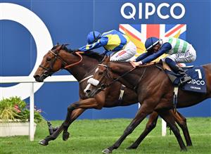 Jockey Hollie Doyle rides Trueshan (L) to victory over jockey David Probert on Coltrane in the Long Distance Cup on Qipco British Champions Day at Ascot Racecourse, west of London on October 15, 2022. - Champions day is the finale of the British flat racing season and the UK's richest raceday. (Photo by Glyn KIRK / AFP) (Photo by GLYN KIRK/AFP via Getty Images)