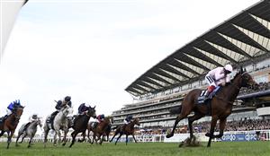 Italian jockey Frankie Dettori rides Emily Upjohn (R) to victory in the British Champions Fillies and Mares Stakes on Qipco British Champions Day at Ascot Racecourse, west of London on October 15, 2022. - Champions day is the finale of the British flat racing season and the UK's richest raceday. (Photo by Glyn KIRK / AFP) (Photo by GLYN KIRK/AFP via Getty Images)