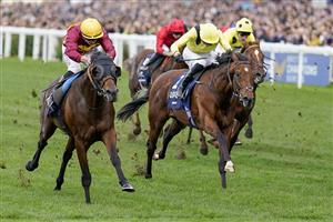 ASCOT, ENGLAND - OCTOBER 15: Tom Marquand riding Bayside Boy win The Queen Elizabeth II Stakes at Ascot Racecourse on October 15, 2022 in Ascot, England. (Photo by Alan Crowhurst/Getty Images)