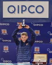 ASCOT, ENGLAND - OCTOBER 15: Benoit de la Sayette with his champion apprentice trophy at Ascot Racecourse on October 15, 2022 in Ascot, England. (Photo by Alan Crowhurst/Getty Images)