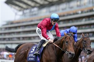 ASCOT, ENGLAND - OCTOBER 15: Richard Kingscote shouts as he rides Bay Bridge to win The Qipco Champion Stakes at Ascot Racecourse on October 15, 2022 in Ascot, England. (Photo by Alan Crowhurst/Getty Images)