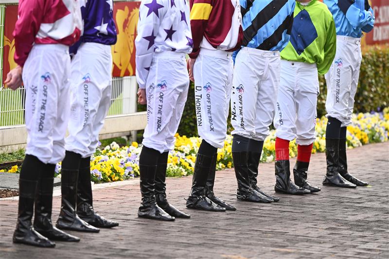 MELBOURNE, AUSTRALIA - OCTOBER 15: Jockeys pose ahead of Race 9, the Carlton Draught Caulfield Cup, during Caulfield Cup Day at Caulfield Racecourse on October 15, 2022 in Melbourne, Australia. (Photo by Vince Caligiuri/Getty Images)