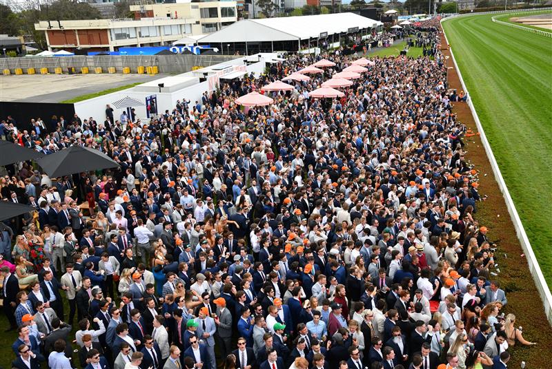 MELBOURNE, AUSTRALIA - OCTOBER 15: General view of crowds during Caulfield Cup Day at Caulfield Racecourse on October 15, 2022 in Melbourne, Australia. (Photo by Vince Caligiuri/Getty Images)