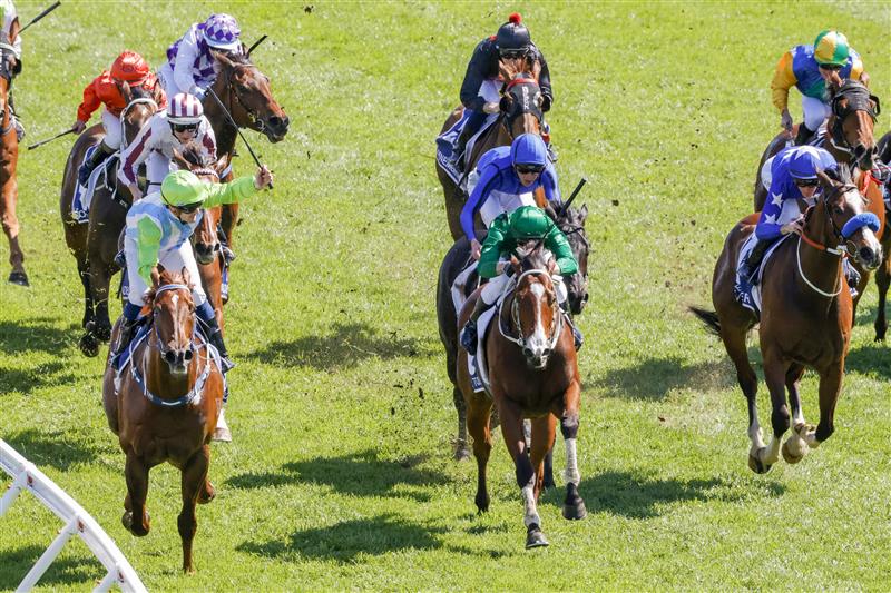 SYDNEY, AUSTRALIA - OCTOBER 15: Tyler Schiller (L) on Front Page wins race 5 The Kosciuszko during Everest Day at Royal Randwick Racecourse on October 15, 2022 in Sydney, Australia. (Photo by Jenny Evans/Getty Images)
