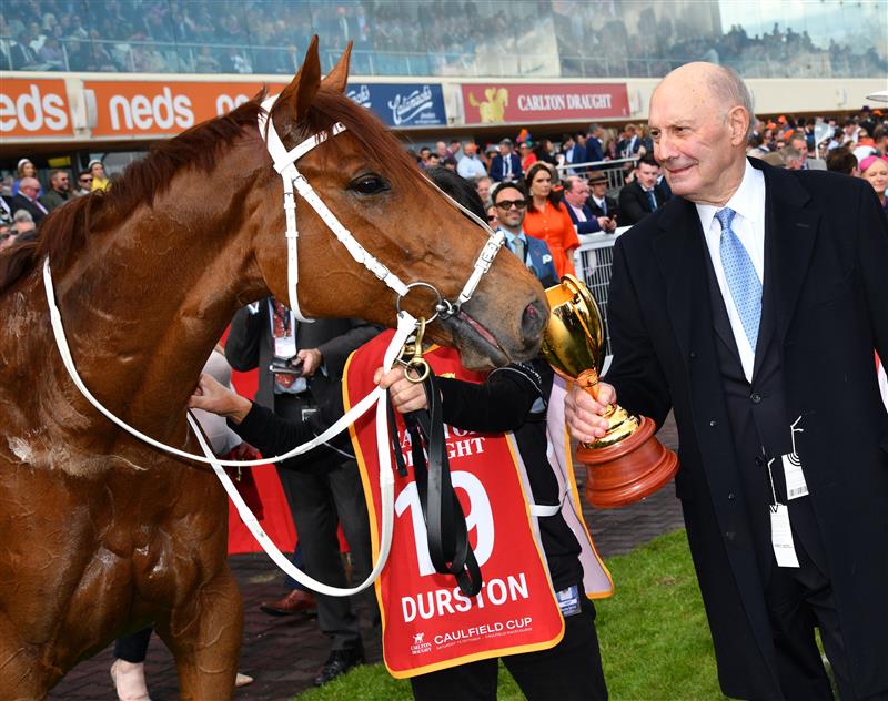 MELBOURNE, AUSTRALIA - OCTOBER 15: Part owner,  Peter Barnett poses with Durston after winning Race 9, the Carlton Draught Caulfield Cup, during Caulfield Cup Day at Caulfield Racecourse on October 15, 2022 in Melbourne, Australia. (Photo by Vince Caligiuri/Getty Images)