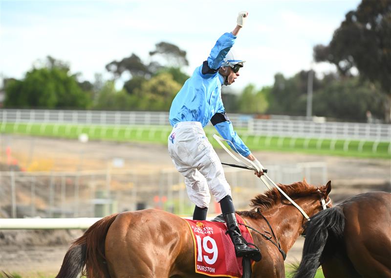 MELBOURNE, AUSTRALIA - OCTOBER 15: Michael Dee riding Durston wins Race 9, the Carlton Draught Caulfield Cup, during Caulfield Cup Day at Caulfield Racecourse on October 15, 2022 in Melbourne, Australia. (Photo by Vince Caligiuri/Getty Images)