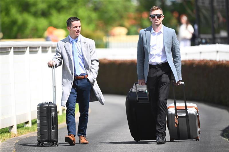 MELBOURNE, AUSTRALIA - OCTOBER 15: Tim Clark and Josh Parr are seen arriving during Caulfield Cup Day at Caulfield Racecourse on October 15, 2022 in Melbourne, Australia. (Photo by Vince Caligiuri/Getty Images)
