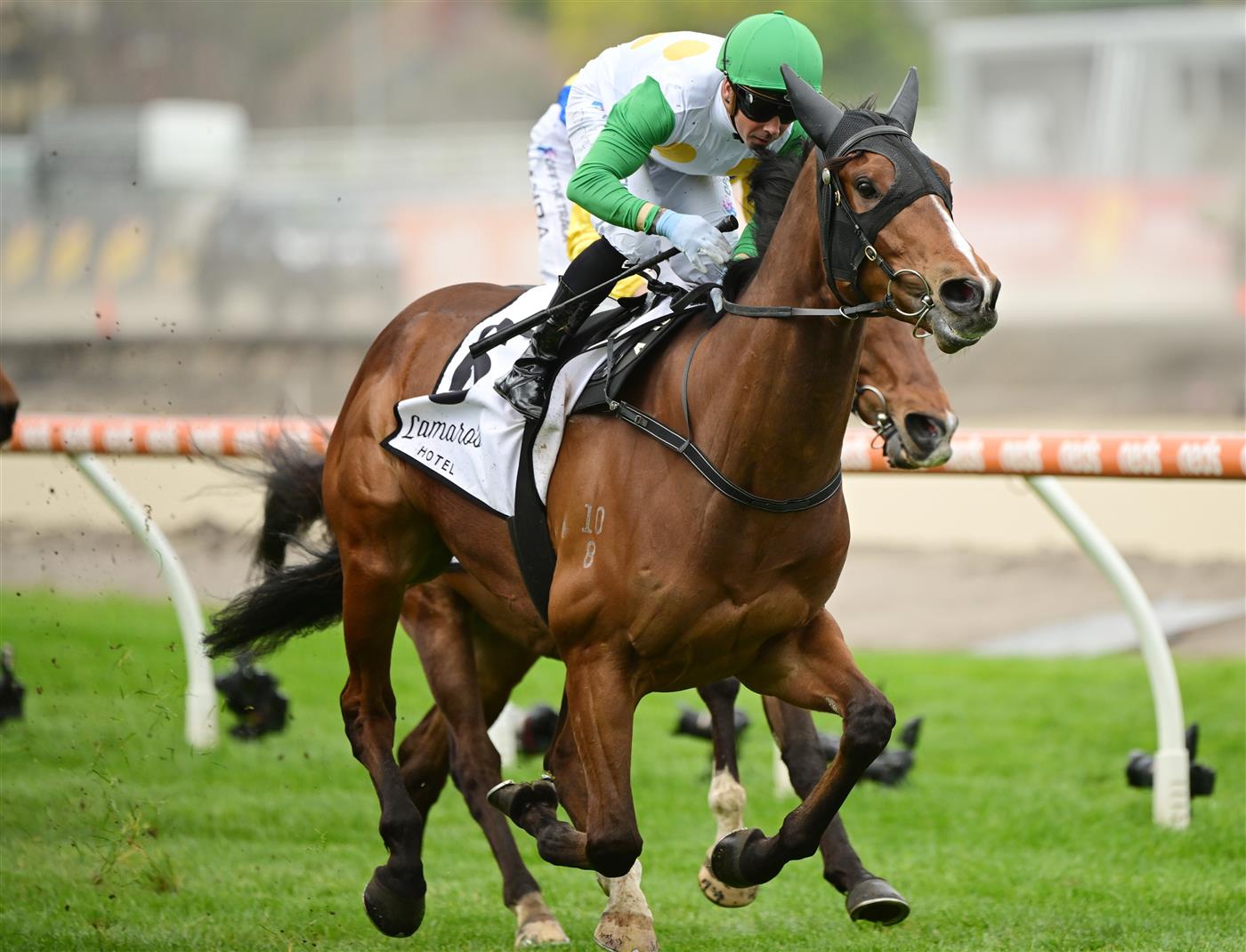 MELBOURNE, AUSTRALIA - OCTOBER 15: Dean Holland riding Saint Bathans winning Race 2, the Lamaro's Hotel Grand Handicap, during Caulfield Cup Day at Caulfield Racecourse on October 15, 2022 in Melbourne, Australia. (Getty)