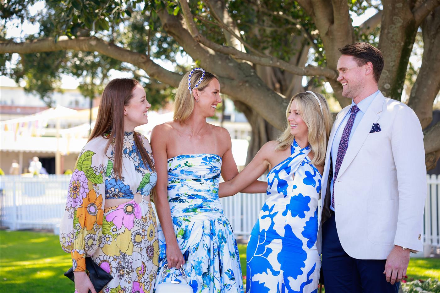 SYDNEY, AUSTRALIA - OCTOBER 15: Emma McKeon, TAB Everest Day Ambassador poses with her family members, Kaitlin, David and Ali during Sydney Racing at Royal Randwick Racecourse on October 15, 2022 in Sydney, Australia. (Photo by Hanna Lassen/Getty Images for ATC)
