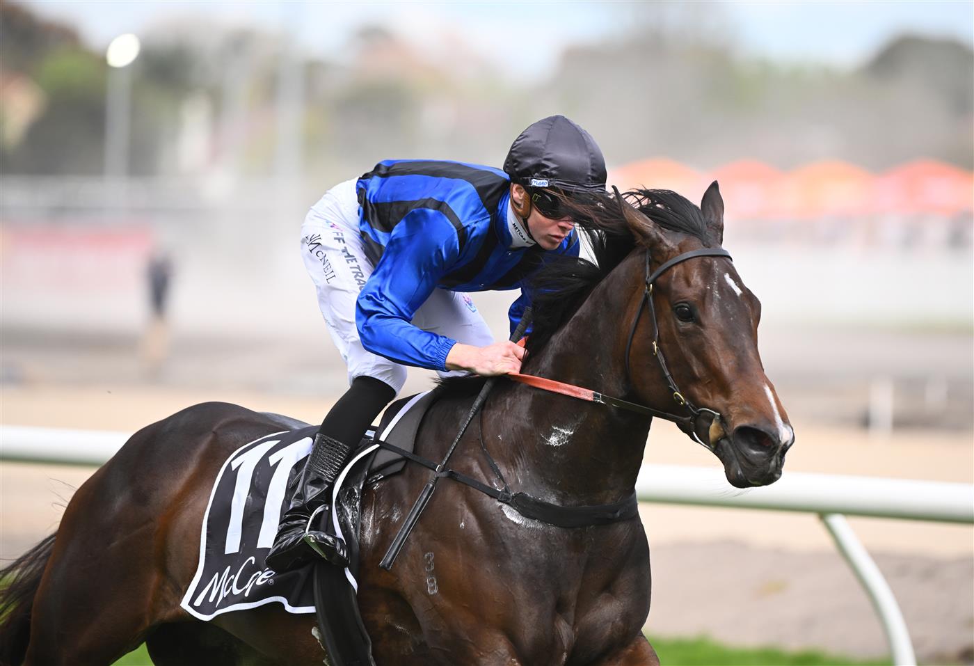 MELBOURNE, AUSTRALIA - OCTOBER 15: Jye McNeil riding Asfoora winning Race 7, the The Mccafe Sprint, during Caulfield Cup Day at Caulfield Racecourse on October 15, 2022 in Melbourne, Australia. (Photo by Vince Caligiuri/Getty Images)