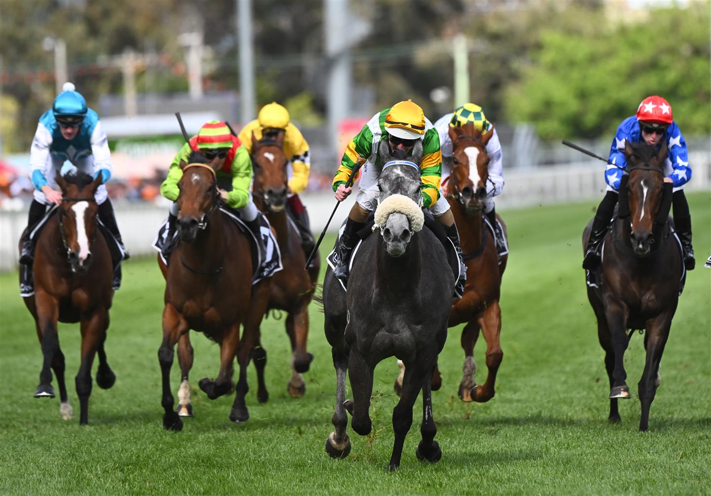 MELBOURNE, AUSTRALIA - OCTOBER 15: Luke Nolen riding Chain of Lightning winning Race 8, the exus Tristarc Stakes, during Caulfield Cup Day at Caulfield Racecourse on October 15, 2022 in Melbourne, Australia. (Photo by Vince Caligiuri/Getty Images)