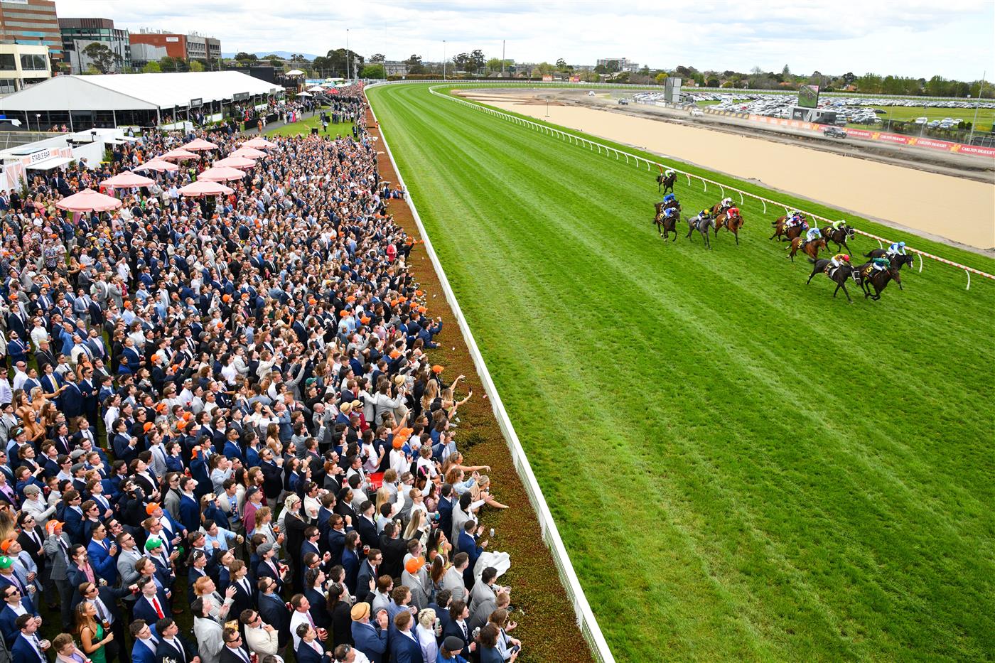 MELBOURNE, AUSTRALIA - OCTOBER 15: Josh Parr riding Renaissance Woman in front of a big crowd on the lawns in winning Race 4, the Schweppes Ethereal Stakes, during Caulfield Cup Day at Caulfield Racecourse on October 15, 2022 in Melbourne, Australia. (Photo by Vince Caligiuri/Getty Images)