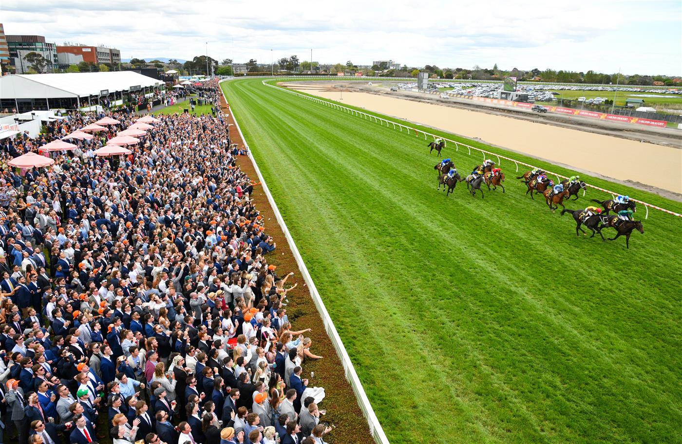 MELBOURNE, AUSTRALIA - OCTOBER 15: Josh Parr riding Renaissance Woman in front of a big crowd on the lawns in winning Race 4, the Schweppes Ethereal Stakes, during Caulfield Cup Day at Caulfield Racecourse on October 15, 2022 in Melbourne, Australia. (Photo by Vince Caligiuri/Getty Images)