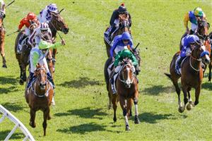 SYDNEY, AUSTRALIA - OCTOBER 15: Tyler Schiller (L) on Front Page wins race 5 The Kosciuszko during Everest Day at Royal Randwick Racecourse on October 15, 2022 in Sydney, Australia. (Photo by Jenny Evans/Getty Images)