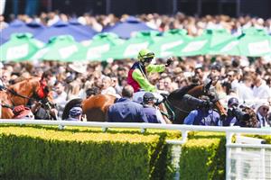 SYDNEY, AUSTRALIA - OCTOBER 15: Robbie Dolan (lime cap) on Cisco Bay returns to scale after winning race 2 the Big Dance Wild Card during Everest Day at Royal Randwick Racecourse on October 15, 2022 in Sydney, Australia. (Photo by Jenny Evans/Getty Images)