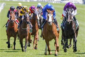 SYDNEY, AUSTRALIA - OCTOBER 15: James McDonald (all blue) on Cascadian wins race 3 the New Tab App Craven Plate during Everest Day at Royal Randwick Racecourse on October 15, 2022 in Sydney, Australia. (Photo by Jenny Evans/Getty Images)