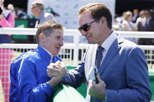 SYDNEY, AUSTRALIA - OCTOBER 15: James McDonald talks to Jason Walsh from Godolphinon after winning race 3 the New TAB App Craven Plate on Cascadian during Everest Day at Royal Randwick Racecourse on October 15, 2022 in Sydney, Australia. (Photo by Mark Evans/Getty Images)