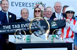 Jockey Craig Williams (R), rider of the wining horse Giga Kick, celebrates victory with the Everest 2022 horse race trophy at the Royal Randwick race course in Sydney on October 15, 2022. - XGTY-- IMAGE RESTRICTED TO EDITORIAL USE - STRICTLY NO COMMERCIAL USE -- (Photo by DAVID GRAY / AFP) / XGTY-- IMAGE RESTRICTED TO EDITORIAL USE - STRICTLY NO COMMERCIAL USE -- (Photo by DAVID GRAY/AFP via Getty Images)