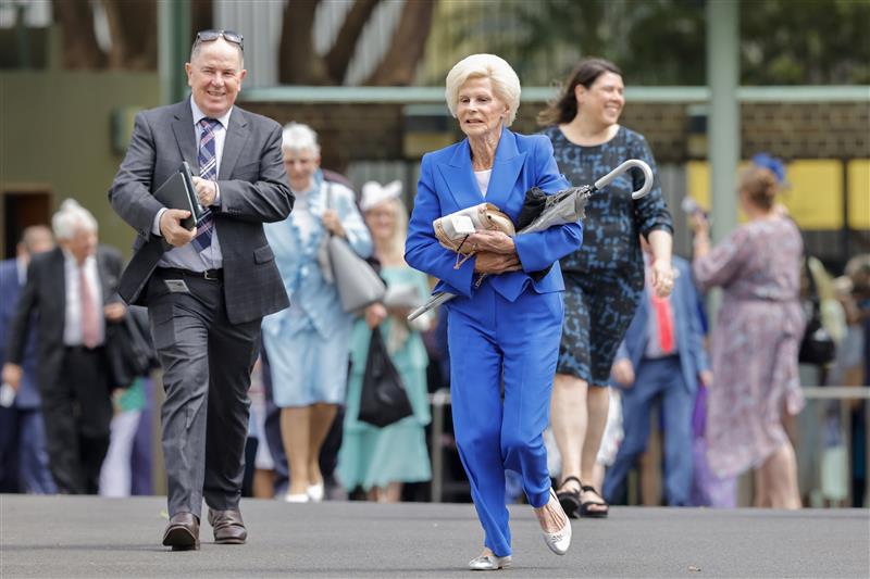 SYDNEY, AUSTRALIA - OCTOBER 22: Racegoers run to get the best spots as the gates open ahead of Spring Champions Stakes Day at Royal Randwick Racecourse on October 22, 2022 in Sydney, Australia. (Photo by Jenny Evans/Getty Images)