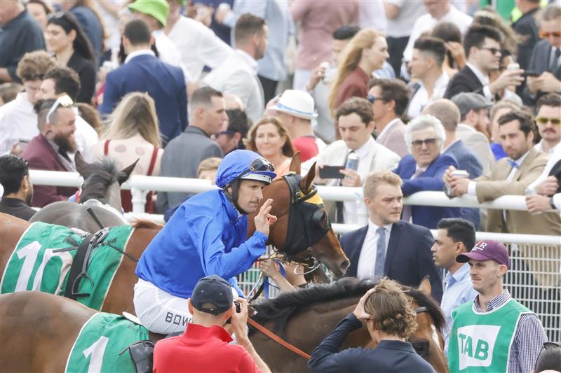 SYDNEY, AUSTRALIA - OCTOBER 22: Hugh Bowman on Golden Mile returns to scale after winning race 7 the Tab Callander-presnell during Spring Champions Stakes Day at Royal Randwick Racecourse on October 22, 2022 in Sydney, Australia. (Photo by Jenny Evans/Getty Images)