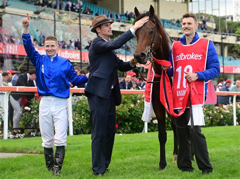 MELBOURNE, AUSTRALIA - OCTOBER 22: James McDonald and Trainer James Cummings celebrate after Anamoe won Race 9, the Ladbrokes Cox Plate,  during Cox Plate Day at Moonee Valley Racecourse on October 22, 2022 in Melbourne, Australia. (Photo by Vince Caligiuri/Getty Images)