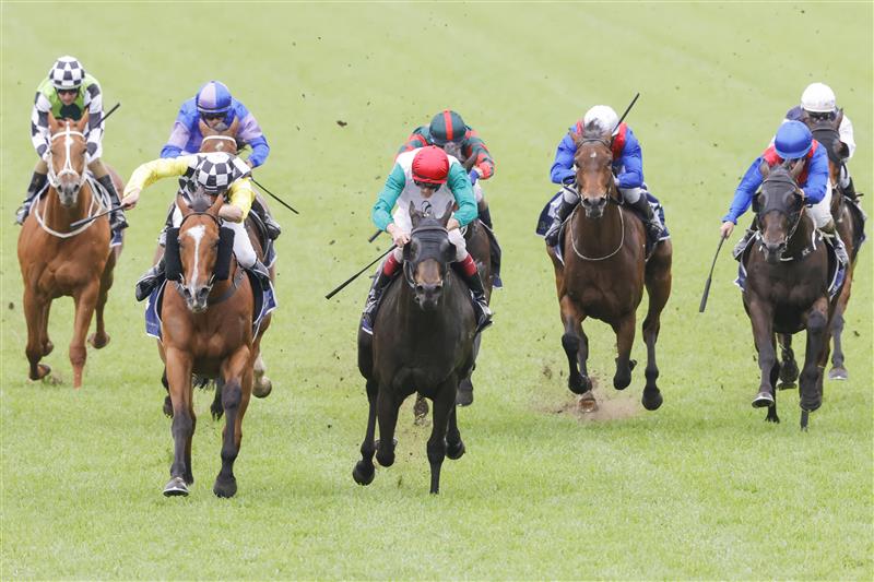SYDNEY, AUSTRALIA - OCTOBER 22: Regan Bayliss (red cap) on Diamil wins race 5 the Vale Beryl White Filante Handicap during Spring Champions Stakes Day at Royal Randwick Racecourse on October 22, 2022 in Sydney, Australia. (Photo by Jenny Evans/Getty Images)