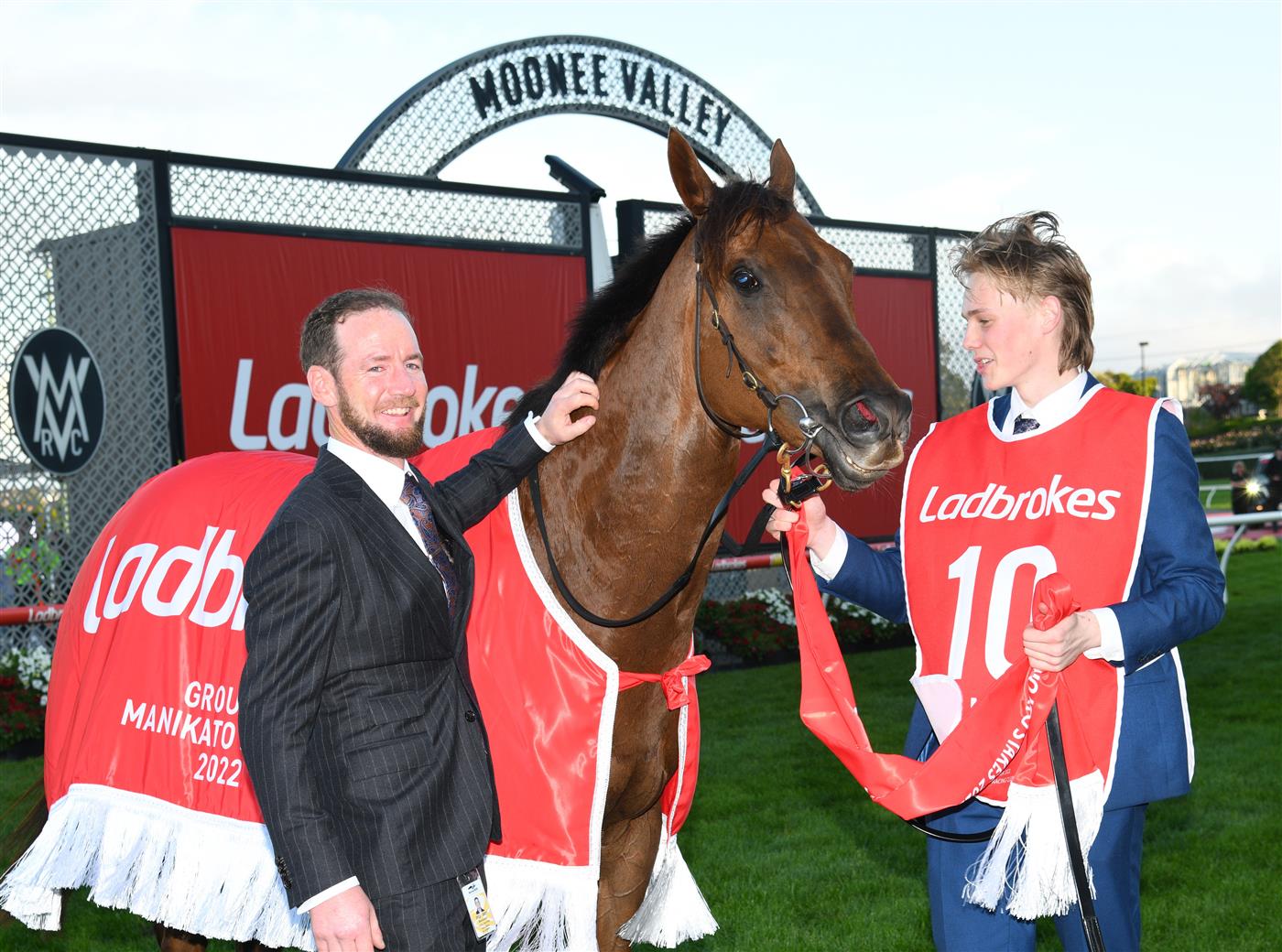 MELBOURNE, AUSTRALIA - OCTOBER 22: Ciaron Maher poses with Bella Nipotina after winning race 11, the Ladbrokes Manikato Stakes during Cox Plate Day at Moonee Valley Racecourse on October 22, 2022 in Melbourne, Australia. (Photo by Vince Caligiuri/Getty Images)