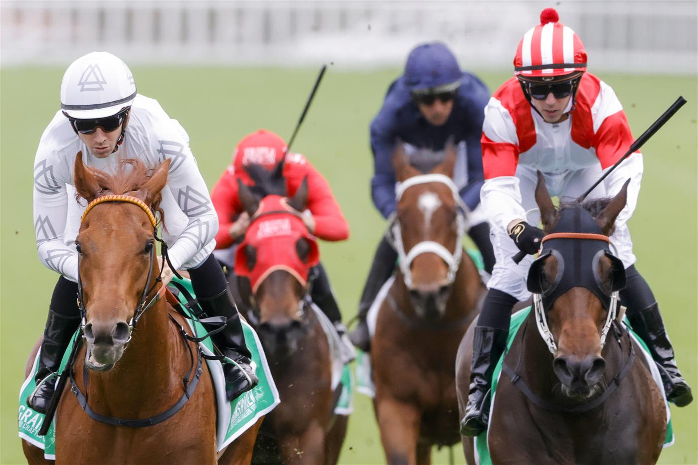 SYDNEY, AUSTRALIA - OCTOBER 22: Jason Collett (all white) on Kote wins race 6 the Grainshaker Brian Crowley Stakes during Spring Champions Stakes Day at Royal Randwick Racecourse on October 22, 2022 in Sydney, Australia. (Photo by Jenny Evans/Getty Images)