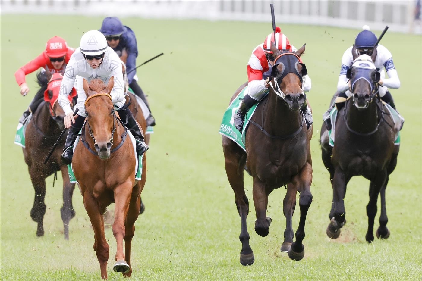 SYDNEY, AUSTRALIA - OCTOBER 22: Jason Collett (all white) on Kote wins race 6 the Grainshaker Brian Crowley Stakes during Spring Champions Stakes Day at Royal Randwick Racecourse on October 22, 2022 in Sydney, Australia. (Photo by Jenny Evans/Getty Images)
