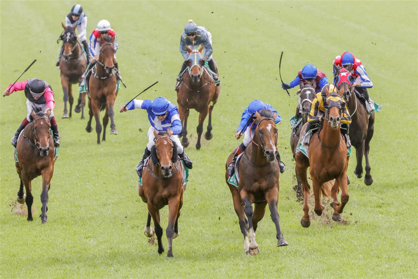 SYDNEY, AUSTRALIA - OCTOBER 22: Hugh Bowman (all blue) on Golden Mile wins race 7 the Tab Callander-presnell during Spring Champions Stakes Day at Royal Randwick Racecourse on October 22, 2022 in Sydney, Australia. (Photo by Jenny Evans/Getty Images)