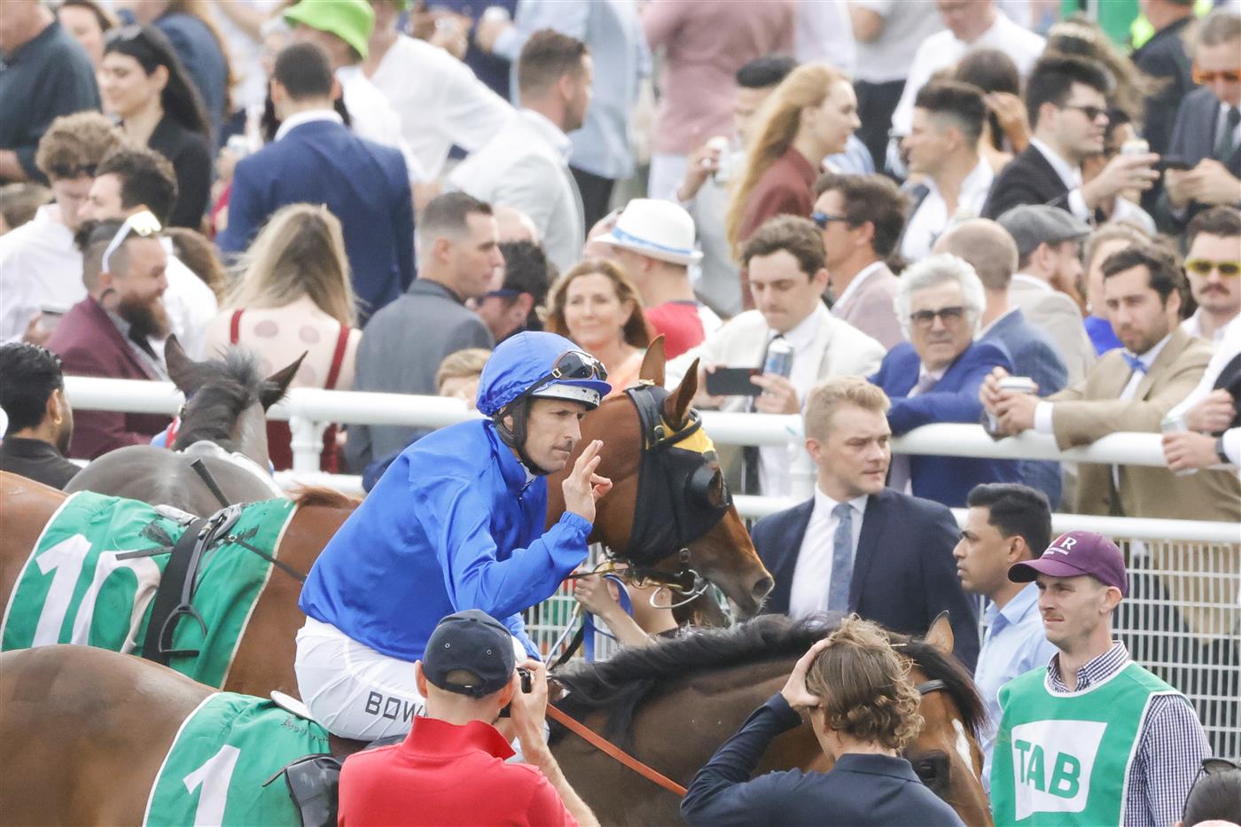 SYDNEY, AUSTRALIA - OCTOBER 22: Hugh Bowman on Golden Mile returns to scale after winning race 7 the Tab Callander-presnell during Spring Champions Stakes Day at Royal Randwick Racecourse on October 22, 2022 in Sydney, Australia. (Photo by Jenny Evans/Getty Images)